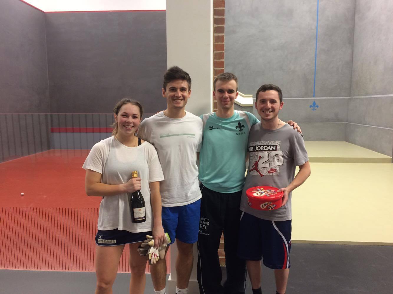Winners with the two university captains of Fives
